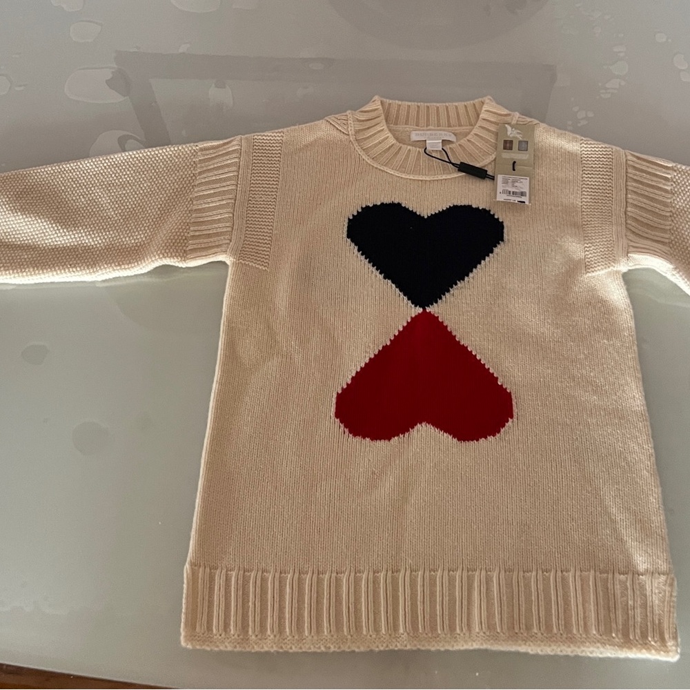 Burberry Cream Sweater with Black and Red Heart Design. 90% wool 10% cashmere